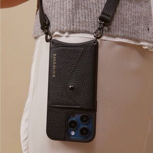 Bandolier Black Pebbled Leather Phone Case for iPhone 15 Pro Max.